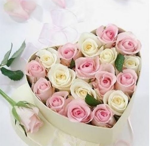 Flower box in the shape of a heart with 17 roses